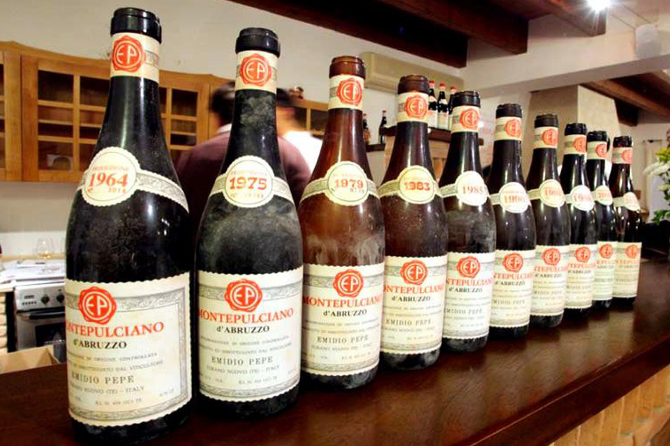A line of Emidio Pepe Montepulciano d'Abruzzo bottles, beginning with the 1964 vintage